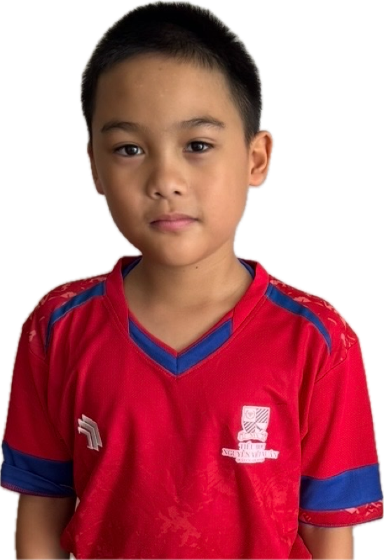 Liam in his school jersey